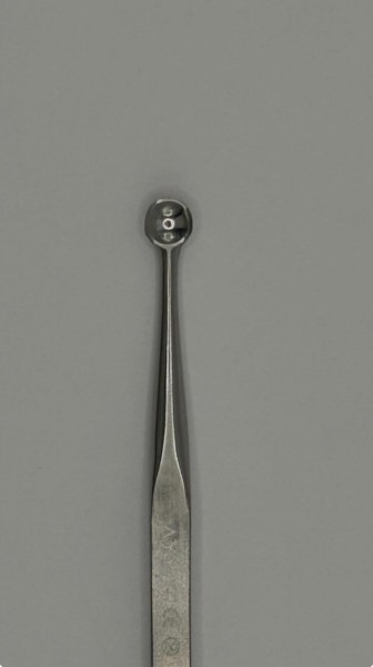 Curette double tranchante